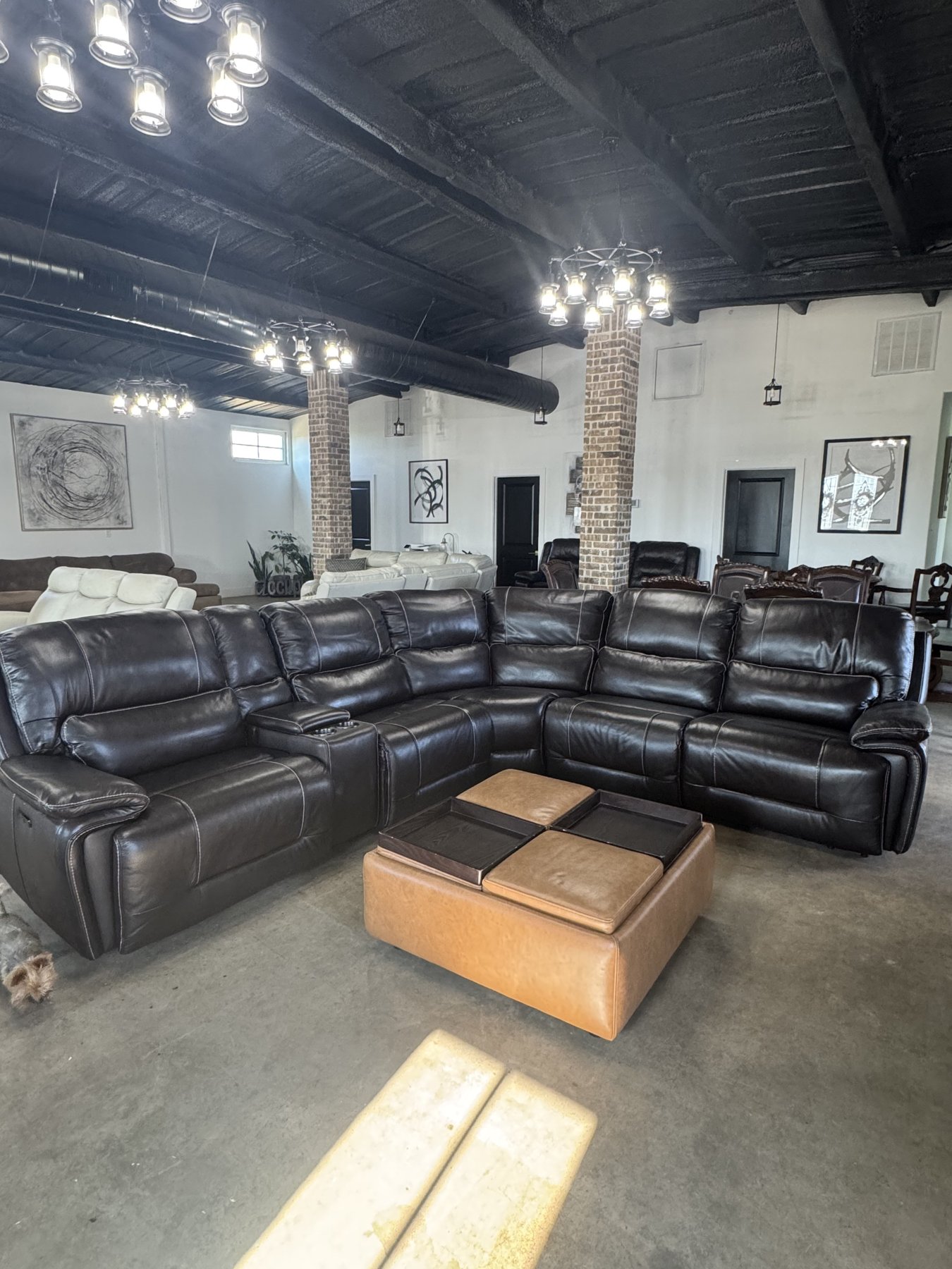 Espresso leather sectional in the Studio 5 showroom